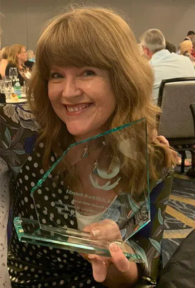Prof Liz Boath pictured with her award