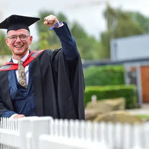 Rory Laudanski in his graduation cap and gown
