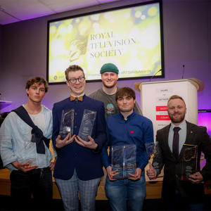 The winners with their trophies