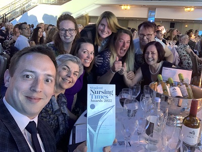 A group of staff members pictured with their Nursing Times Award