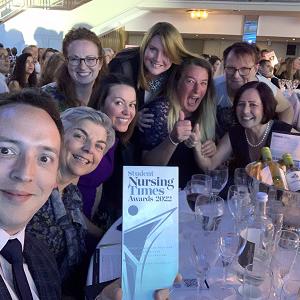 A group of staff members pictured with their Nursing Times Award