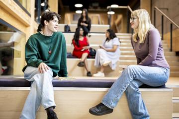 Students enjoying the new University of Staffordshire Student Hub, part of the £100m Student Village.