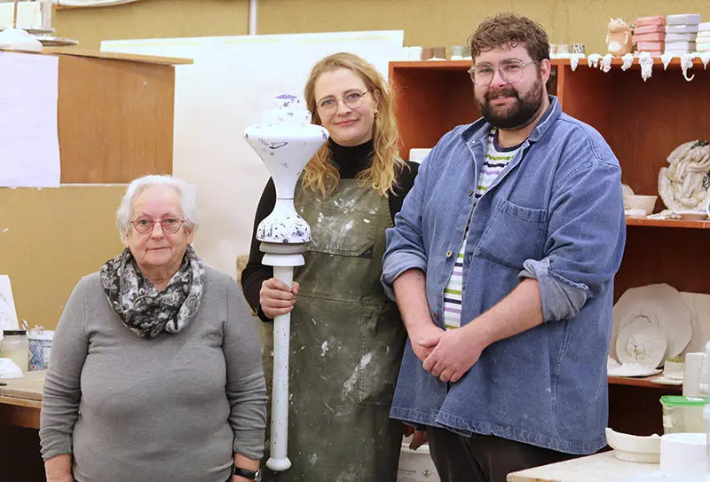 The students holding the mace