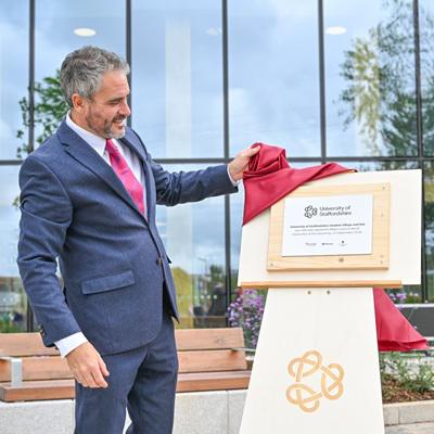 Major Levison Wood unveiling the official plaque at the new Student Village