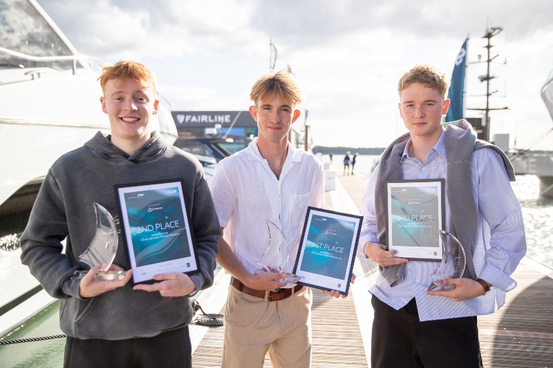 James pictured with the two other winners holding their certificate
