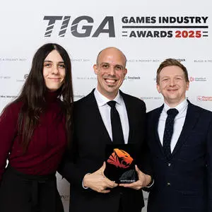 Dr Jennifer Challenor, Professor Chris Headleand and Dr Kieran Hicks with the TIGA trophy