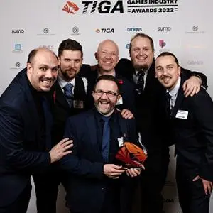 A group of six Games lecturers with their award at the TIGA Games Industry Awards