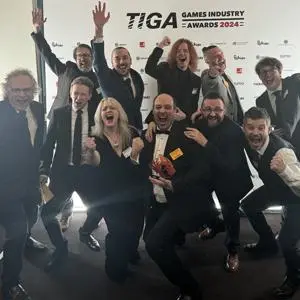 Team of people in celebratory mood