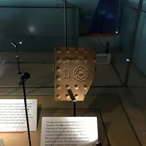 The Treblinka gas chamber tile in a display cabinet
