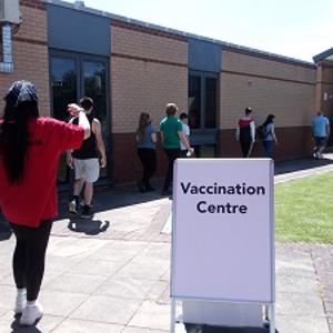 Students queuing to be vaccinated outside the LRV