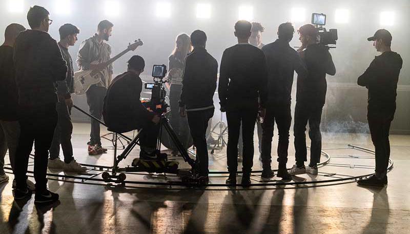Students involved in the filming of a music video