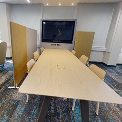 Meeting space with a visualisation screen.
