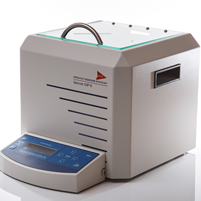 Plastic electronics spin coating system