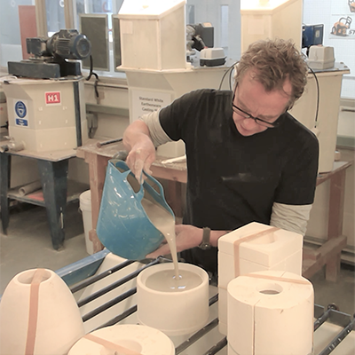Slip casting into a mould