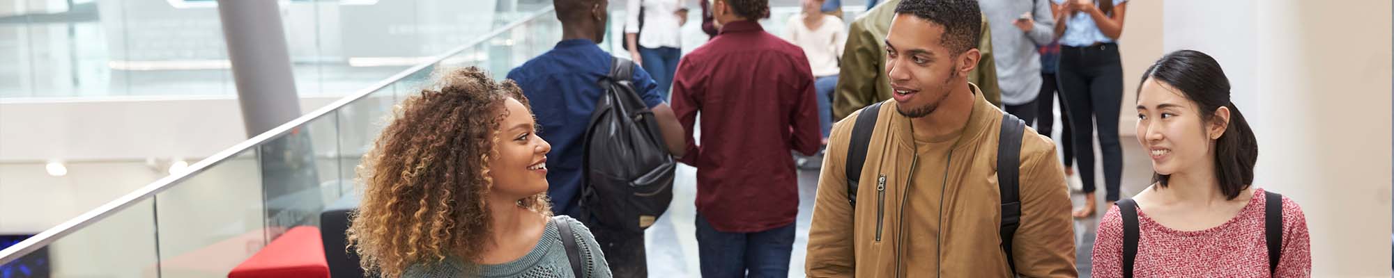 students talking in corridor