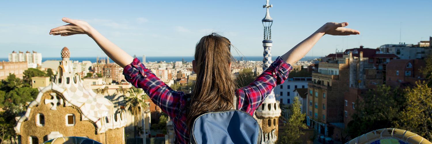 An Erasmus student with arms outstretched