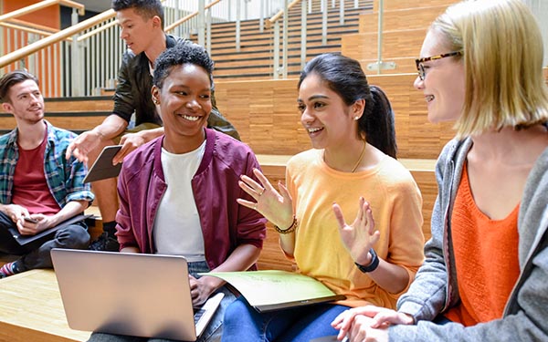 three female students chatting