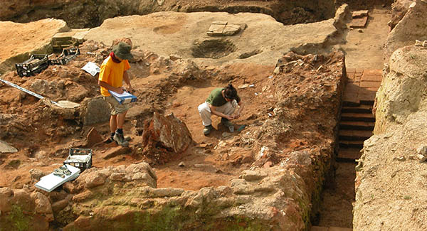 archaeological researchers at a dig site