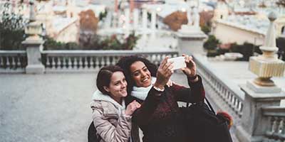 two young women take a selfie in Barecelona
