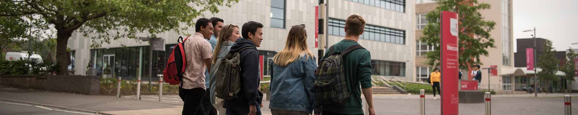 group of students walking on campus